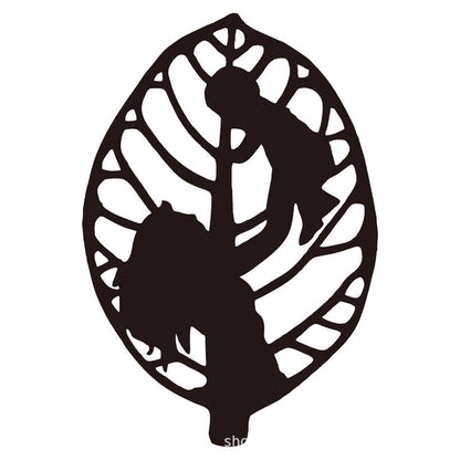 Wrought iron leaf decorations