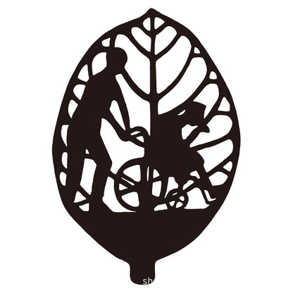 Wrought iron leaf decorations