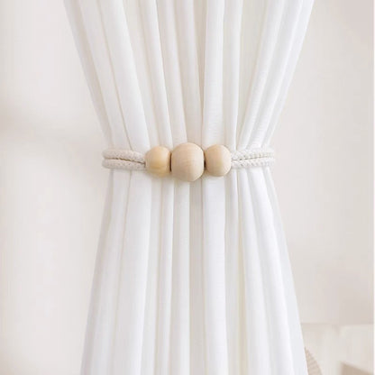 Magnetic curtain tie rope