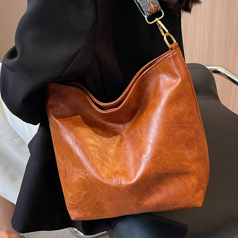 Retro geometric print sling bag