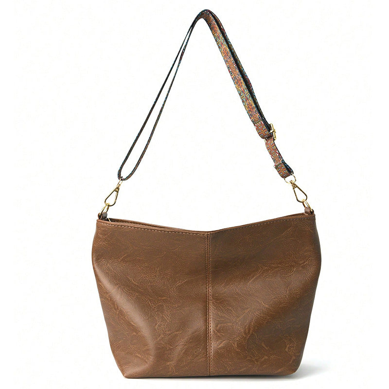 Retro geometric print sling bag