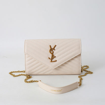 Covered shoulder bag