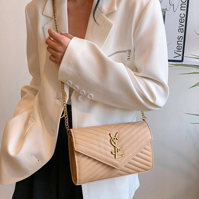 Covered shoulder bag