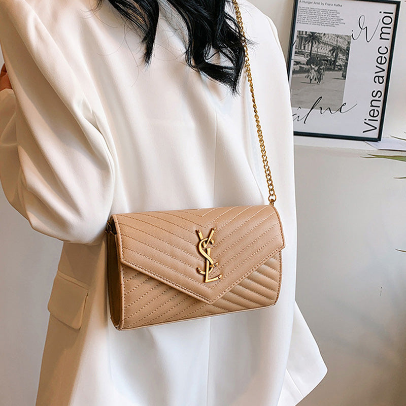 Covered shoulder bag