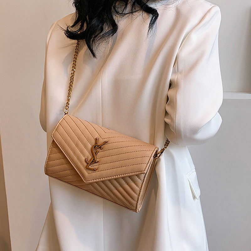 Covered shoulder bag