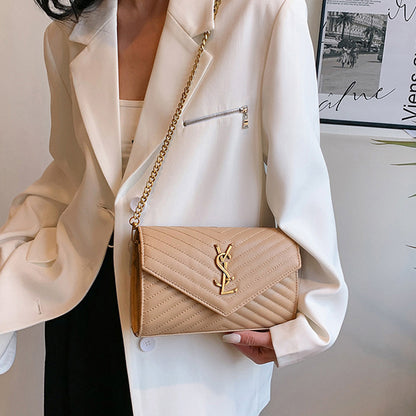 Covered shoulder bag