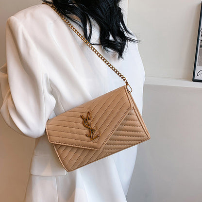 Covered shoulder bag