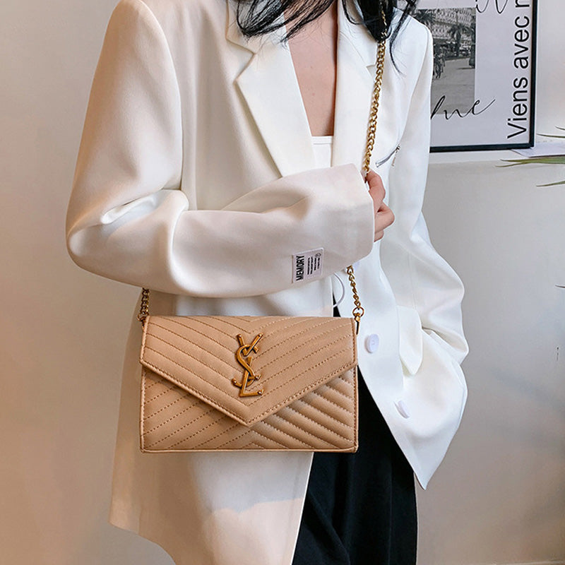 Covered shoulder bag