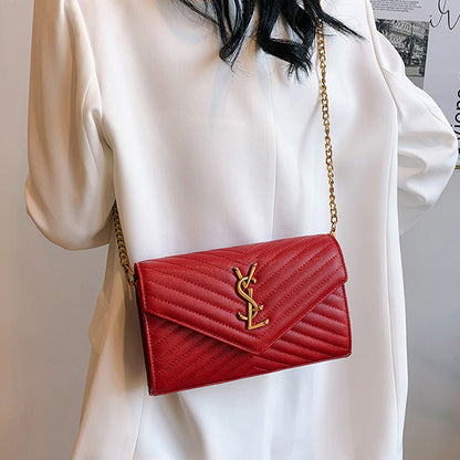 Covered shoulder bag