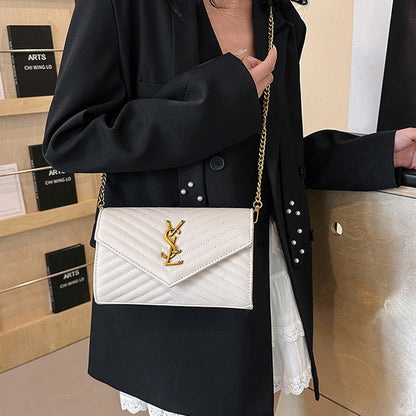 Covered shoulder bag