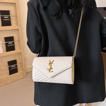 Covered shoulder bag