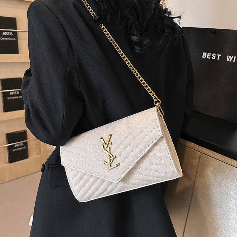 Covered shoulder bag