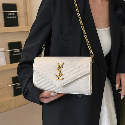 Covered shoulder bag
