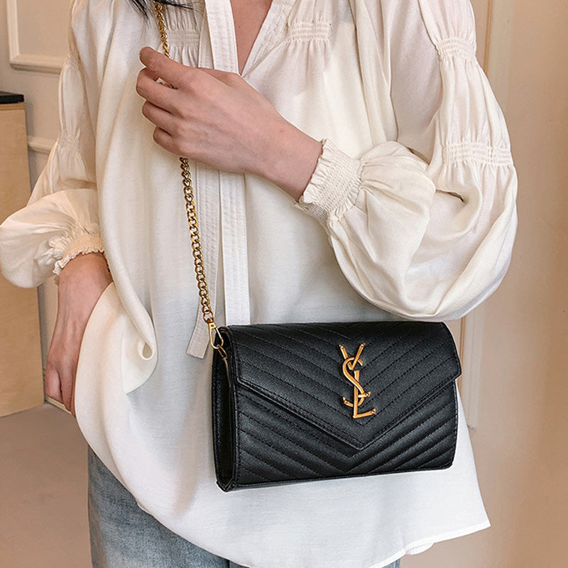 Covered shoulder bag