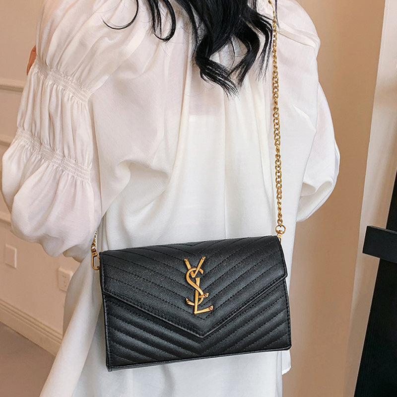 Covered shoulder bag
