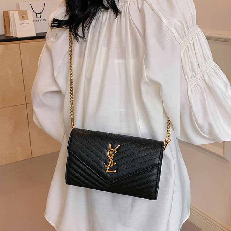 Covered shoulder bag