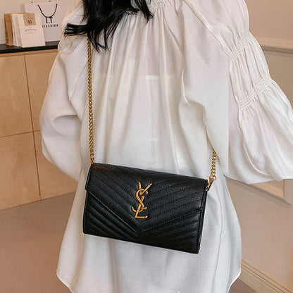 Covered shoulder bag