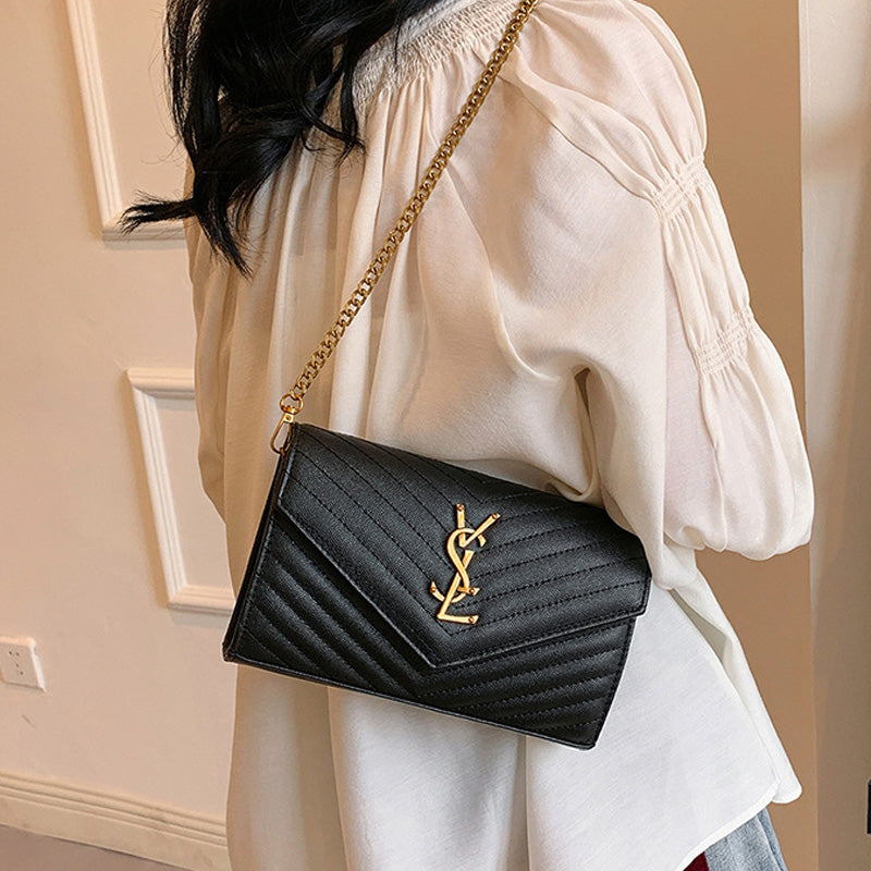 Covered shoulder bag