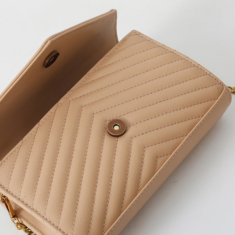 Covered shoulder bag
