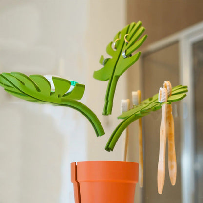 Mirrored monster bamboo toothbrush stand